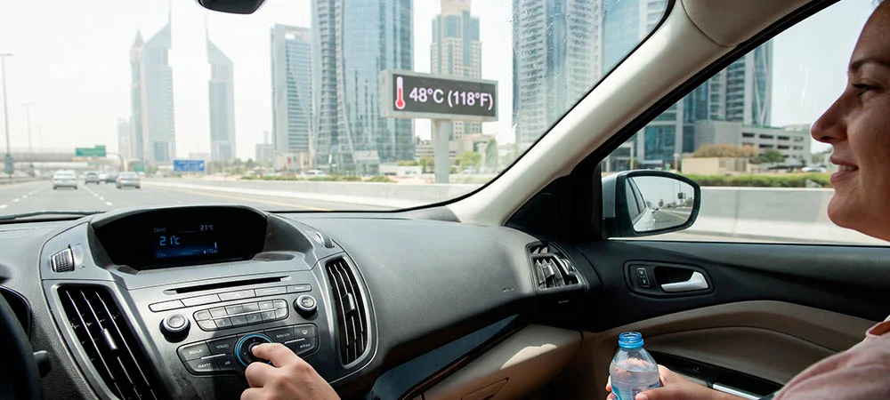 Woman using car AC in extreme heat – GCC vs American Spec Cars