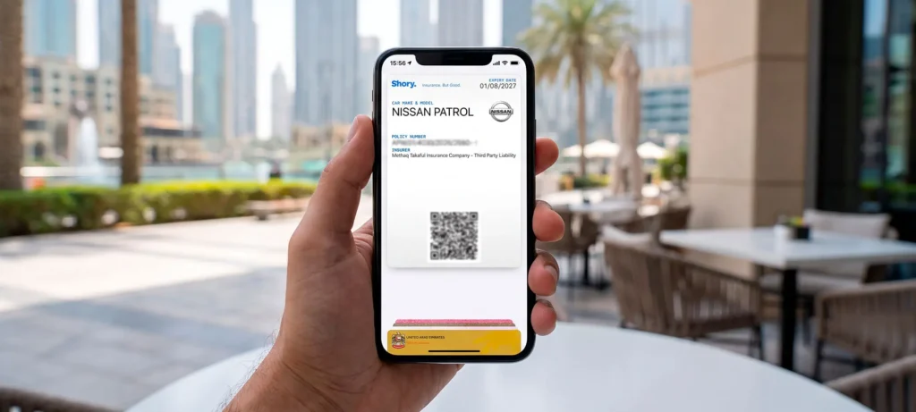 Smartphone displaying a car insurance policy for the documents required to sell a car in Dubai