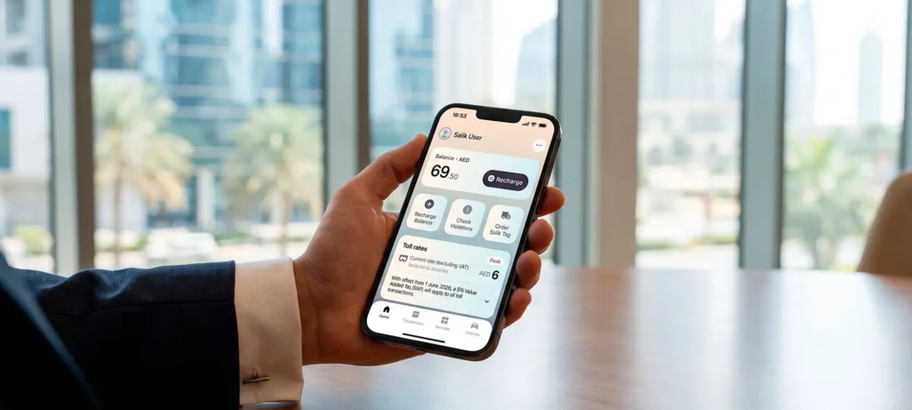 Car seller checking Salik balance on a smartphone
