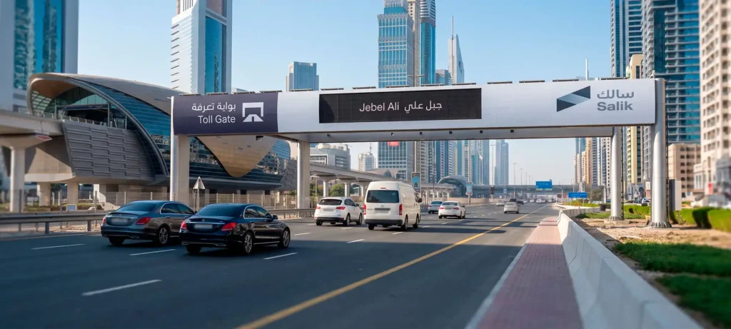 Salik toll gate on a Dubai road, illustrating where drivers need a sufficient balance for each toll crossing