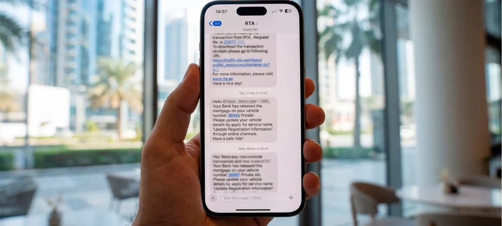 Bank SMS confirming the release of a car mortgage after loan settlement in Dubai